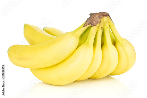 Group of eight whole fresh yellow banana one cluster isolated on white background