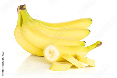 Group of lot of whole one half three slices of fresh yellow banana isolated on white background