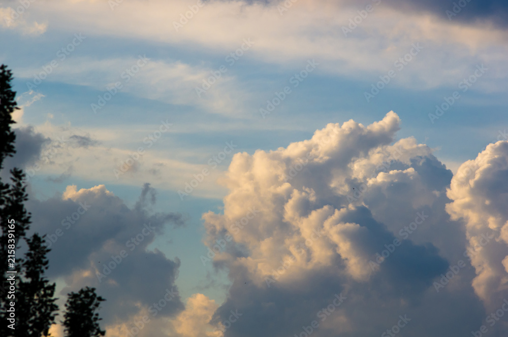 Landscape with dramatic light - beautiful golden sunset with saturated sky and clouds. Landscape with dramatic light - beautiful golden sunset with saturated sky and clouds.
