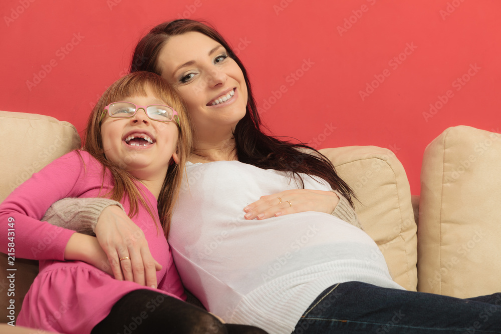 pregnant woman with her daughter pregnant woman with her daughter