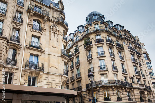 Antique buildings at Danton street in Paris France photo