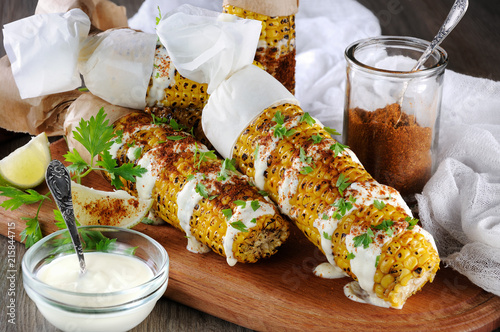 Grilled corn cobs photo
