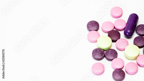 Multicolored vitamin pills.