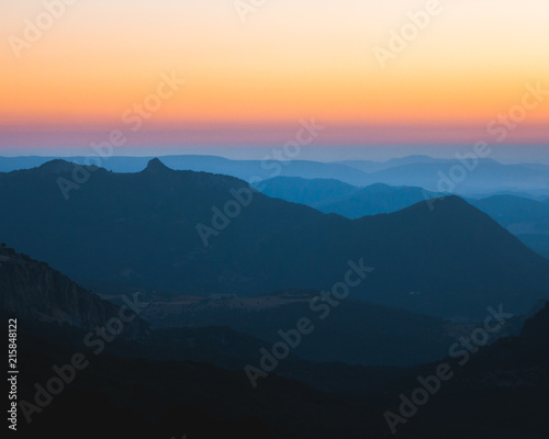 Layers of mountains sunset