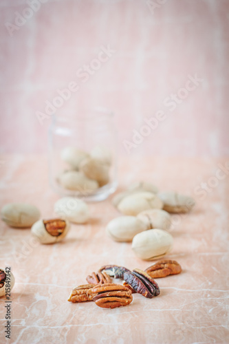 Nice pecan nuts over pink p...