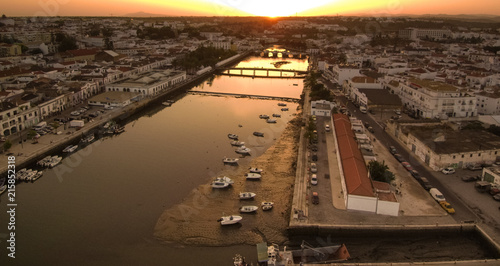 Portugal. Vista a erea de Tavira en el Algarve con canal y casas photo