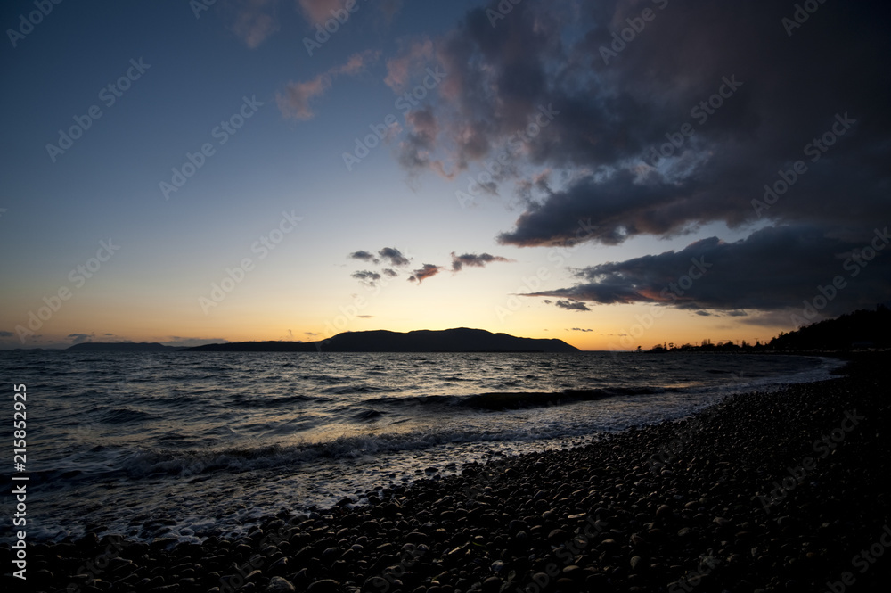 Sunset View of Orcas Island from a Lummi Island Beach. The view here is from Lummi Island near Bellingham, Washington. 
