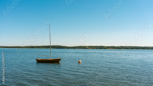 Sailboat on the blue ocean