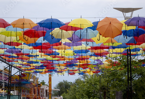 Street decorated with colored umbrellas in Odessa, Ukraine photo