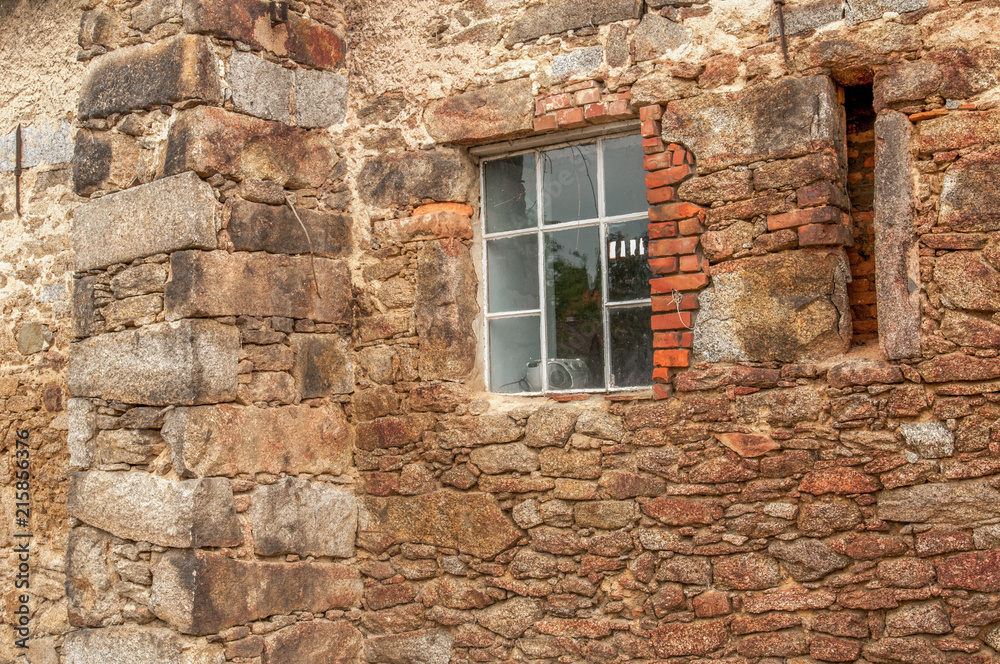 Stone wall with black window 1