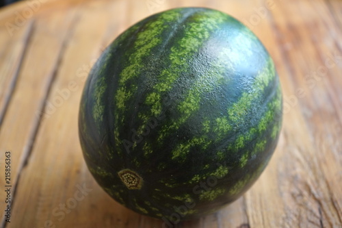 Watermelon on wooden table