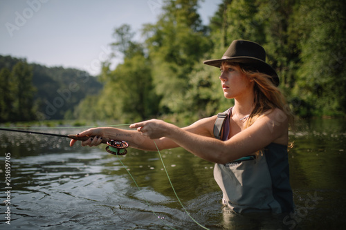 Allie Vannoy fly fishing in the Hiwassee River, TN
