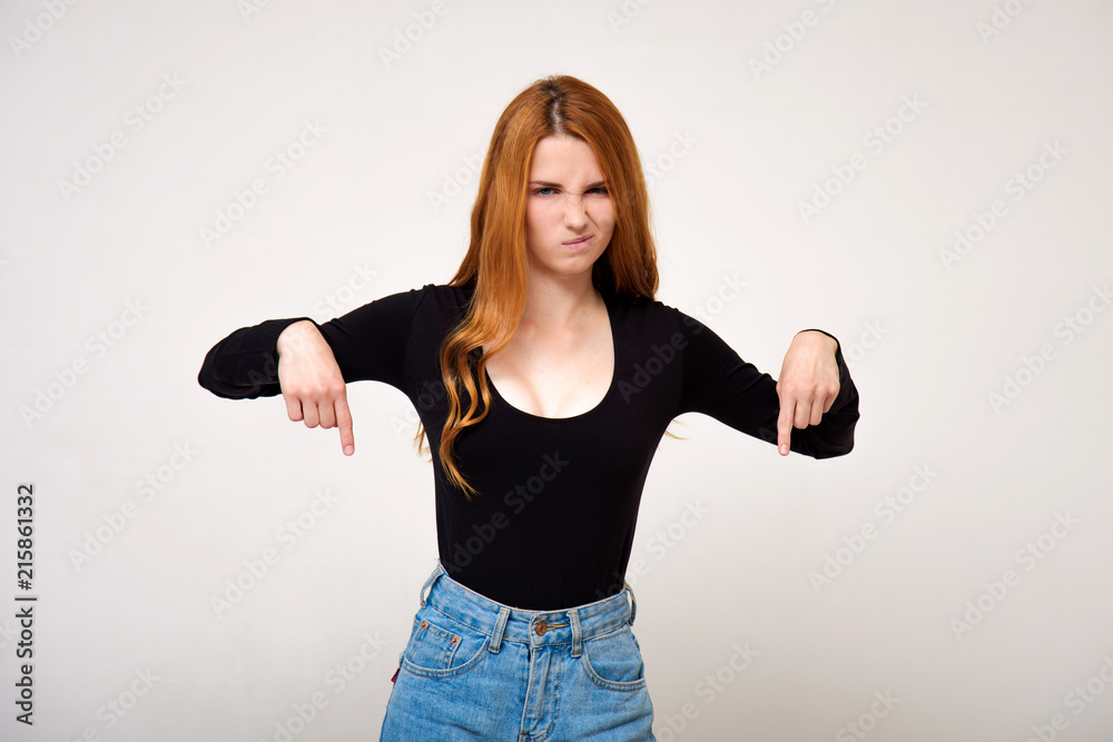 portrait of a beautiful girl with red hair on a white background with different emotions. portrait of a beautiful girl with red hair on a white background with different emotions.
