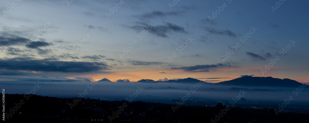 Foggy Sunset on Mountain Landscape