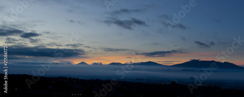 Foggy Sunset on Mountain Landscape