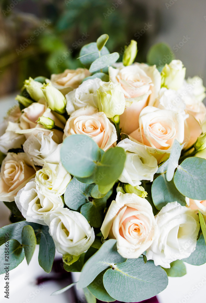 Wedding bouquet of white and pink roses