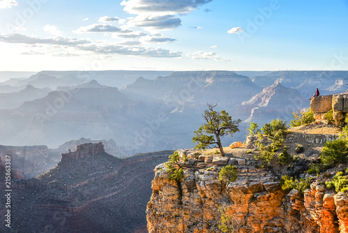 Hiker in amazing Landscape scenery of South Rim of Grand Canyon National Park, Arizona, United States photo
