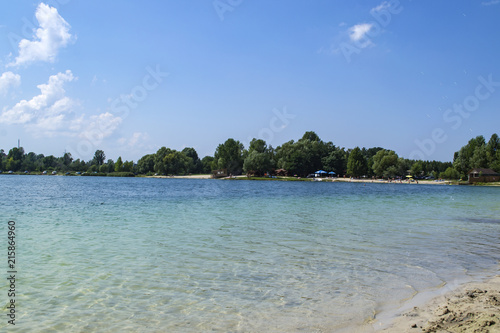 Fototapeta Naklejka Na Ścianę i Meble -  Beautiful blue lake. Summer landscape. The beauty of nature.