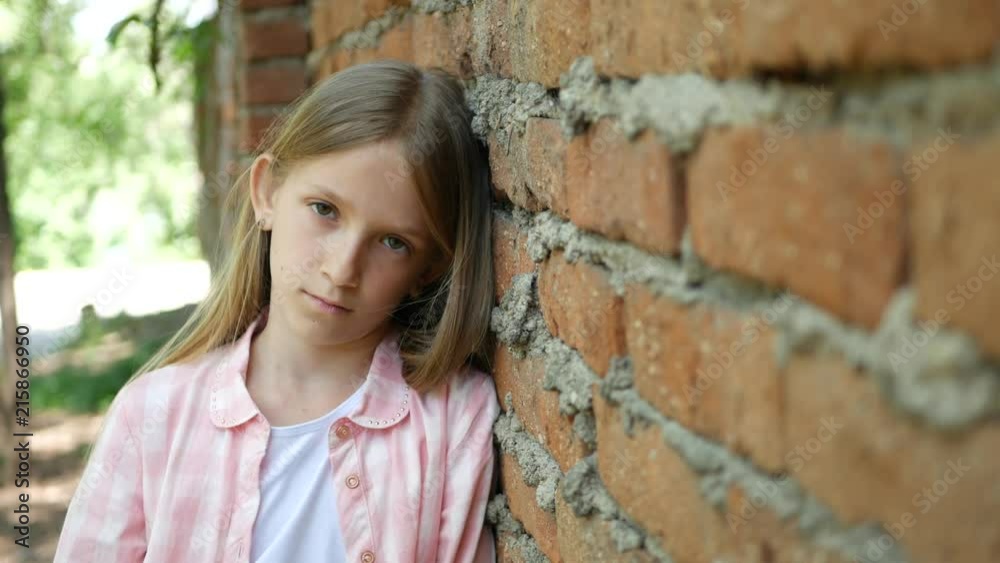 Sad Unhappy Child Looking in Camera, Bored Girl Portrait, Depressed Kid Face Sad Unhappy Child Looking in Camera, Bored Girl Portrait, Depressed Kid Face