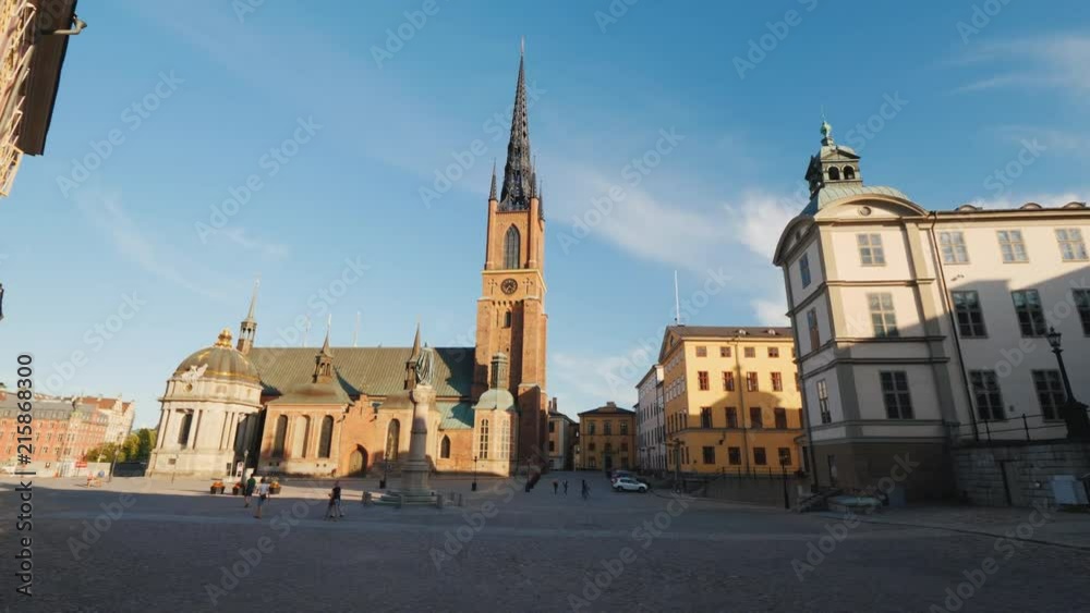 Pan shot of the famous church with an metal spire in Stockholm - Riddarholmen Church. Pan shot of the famous church with an metal spire in Stockholm - Riddarholmen Church.
