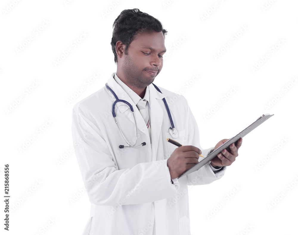 General practitioner writing a prescription for a patient General practitioner writing a prescription for a patient