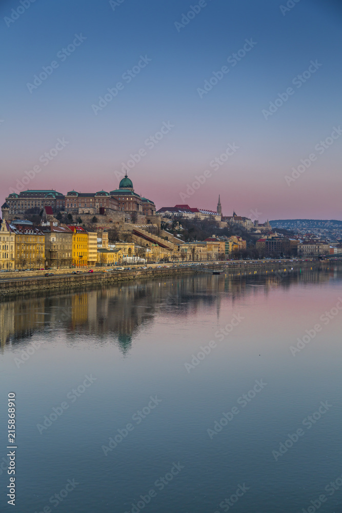 View of Budapest Castle reflecting in the Danube River during early morning, Budapest, Hungary View of Budapest Castle reflecting in the Danube River during early morning, Budapest, Hungary