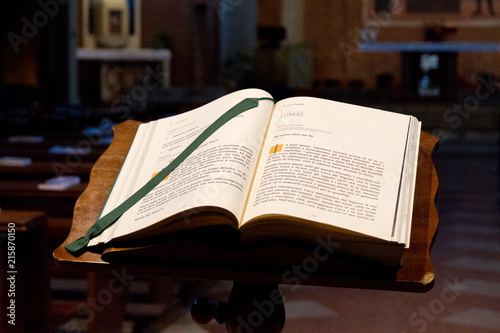 Pavia, Italy. 2 February 2018. An open Bible for the visitors to read today's lecture in a Catholic church.