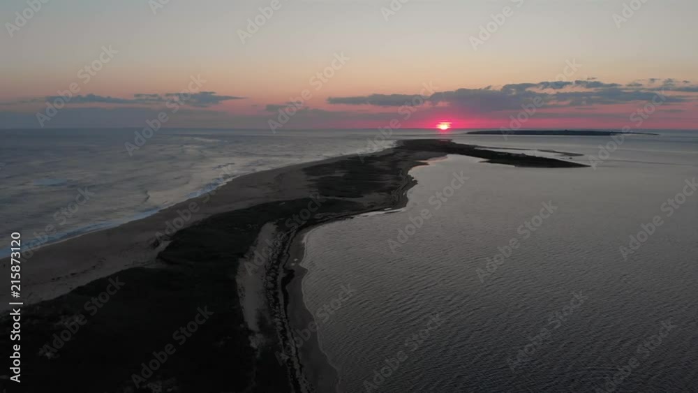 Aerial drone shot of a sunset over Nantucket island in Massachusetts. Aerial drone shot of a sunset over Nantucket island in Massachusetts.