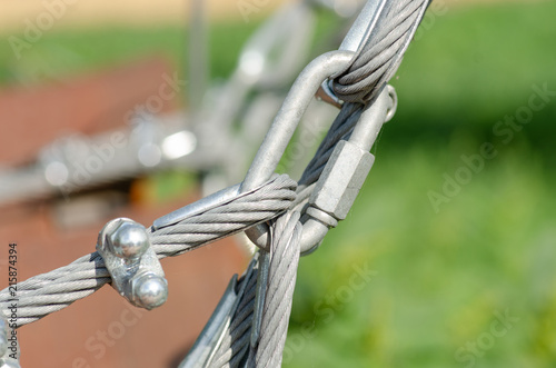 Metal rope fastening, a park of rock-climbers