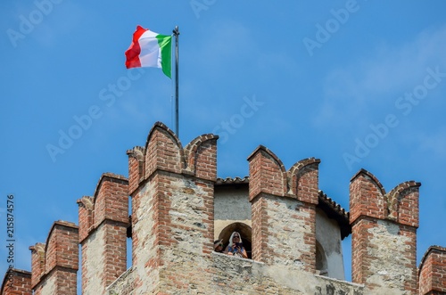 Tourists at medieval Sirmione Scaliger Castle, Italy photo