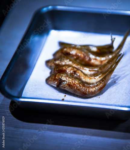 tiny cooked fish