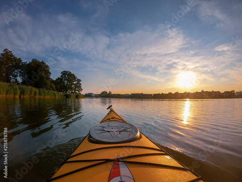 Kayaking on the lake, evening sun