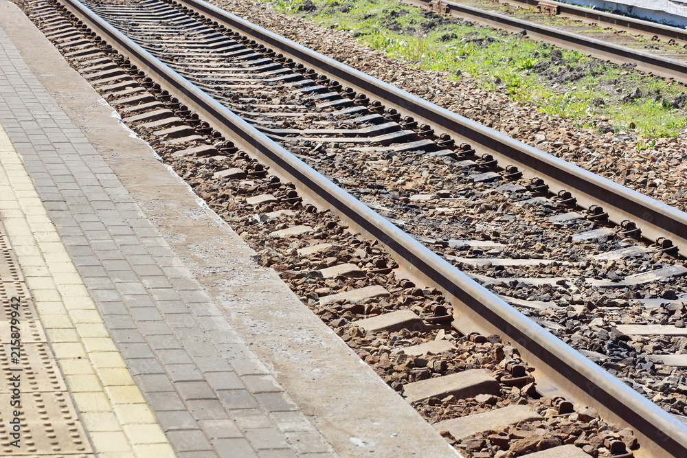 railway track at the railway station platform railway track at the railway station platform