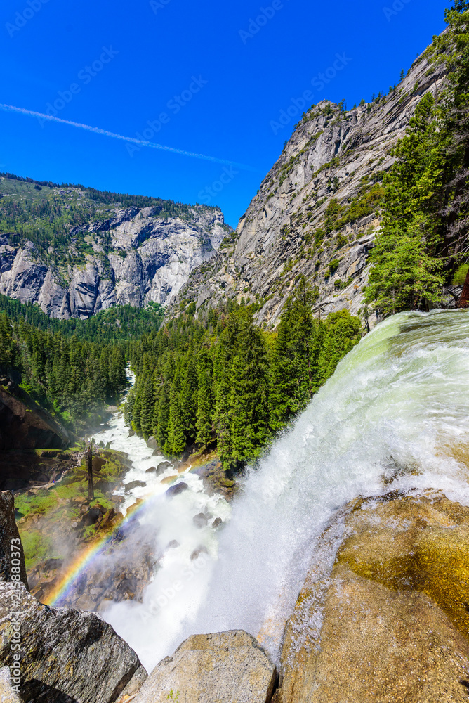 Fototapeta premium Vernal Falls and Merced River, Hiking at Nevada Falls along John Muir Trail and Mist Trail, Yosemite National Park, California, USA