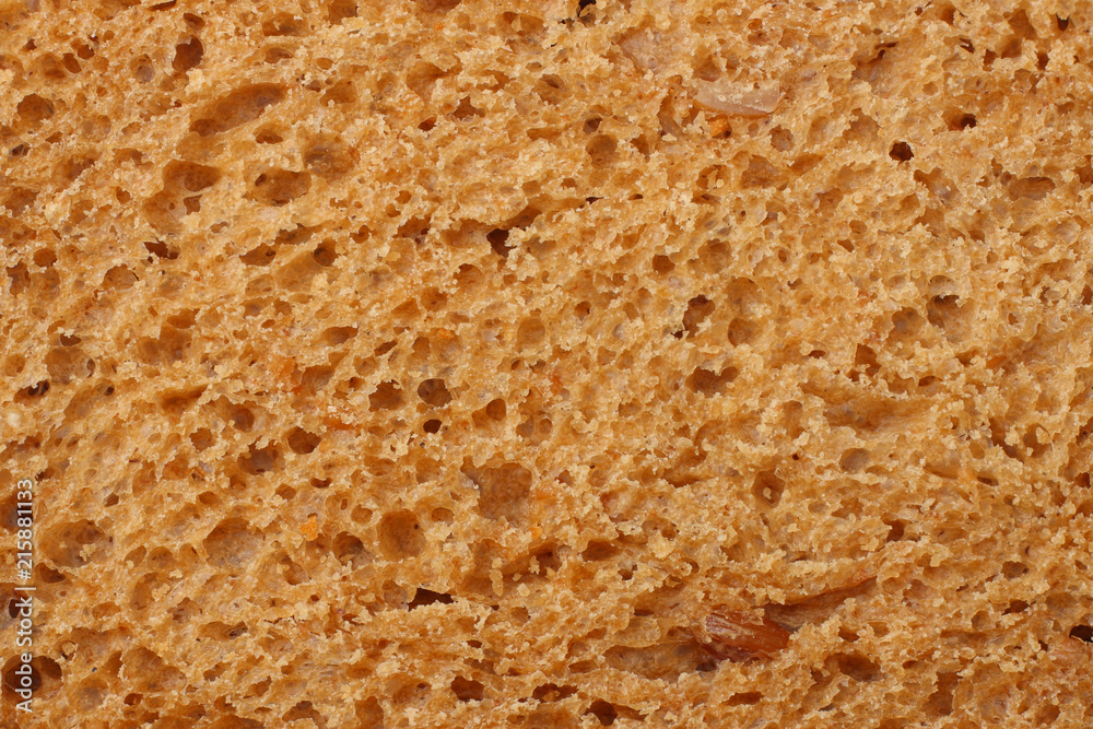 Whole grain bread texture background. macro. top view
