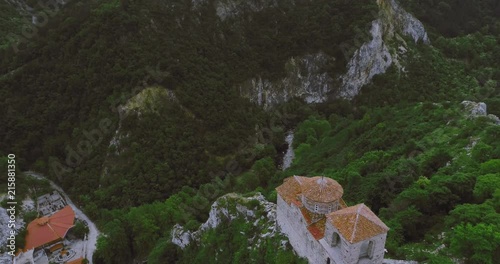 Smooth Slow Aerial View Of The Asen's  Fortress In Asenovgrad Plovdiv Bulgaria With Green Grass In Summer Afternoon Tourist Destination photo