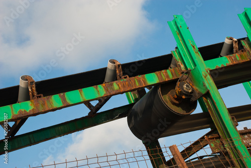 Part of old equipment for transportation and distribution salt. Industrial elevator. photo