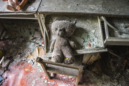 a toy doll baby in an abandoned city Pripyat, Chernobyl photo