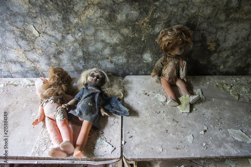 a toy doll baby in an abandoned city Pripyat, Chernobyl photo