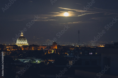 City view of Saint Peter?s Basilica in Roome at night photo