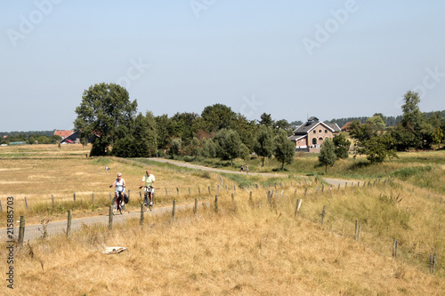 Bicyclists on the dike along the Eastern Scheldt