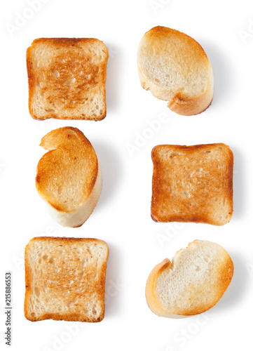 Tosted bread slices, isolated on white background, top view.