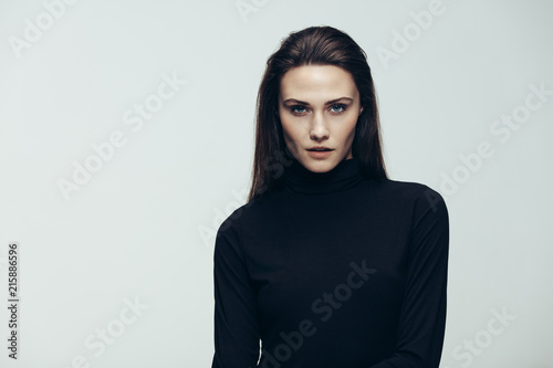 Photography Confident female model in black dress