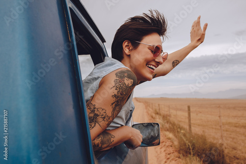 Beautiful woman enjoying road trip