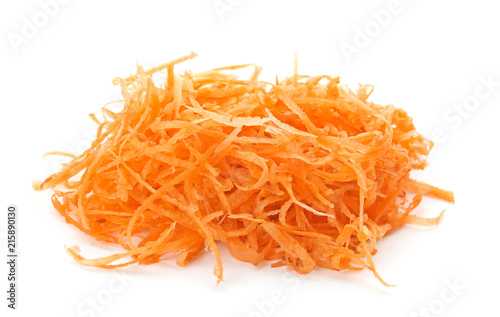 Grated ripe carrot on white background