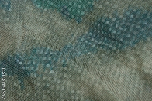 gray green fabric texture from a piece of dirty cloth