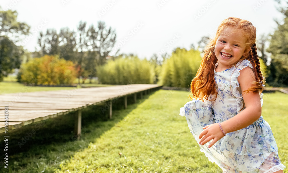 Portrait of a smiling little redhead girl Portrait of a smiling little redhead girl