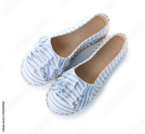 Pair of stylish new shoes on white background, top view