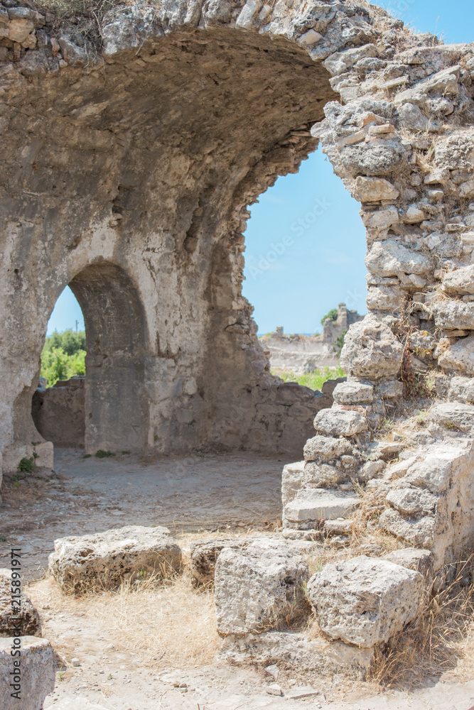 Ancient Side. Turkey. Ruins of the ancient city. Hospital. Interior. Arched doorway and window