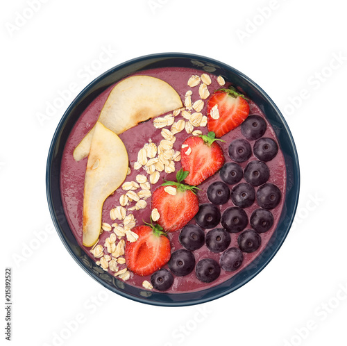 Bowl with tasty acai smoothie on white background, top view